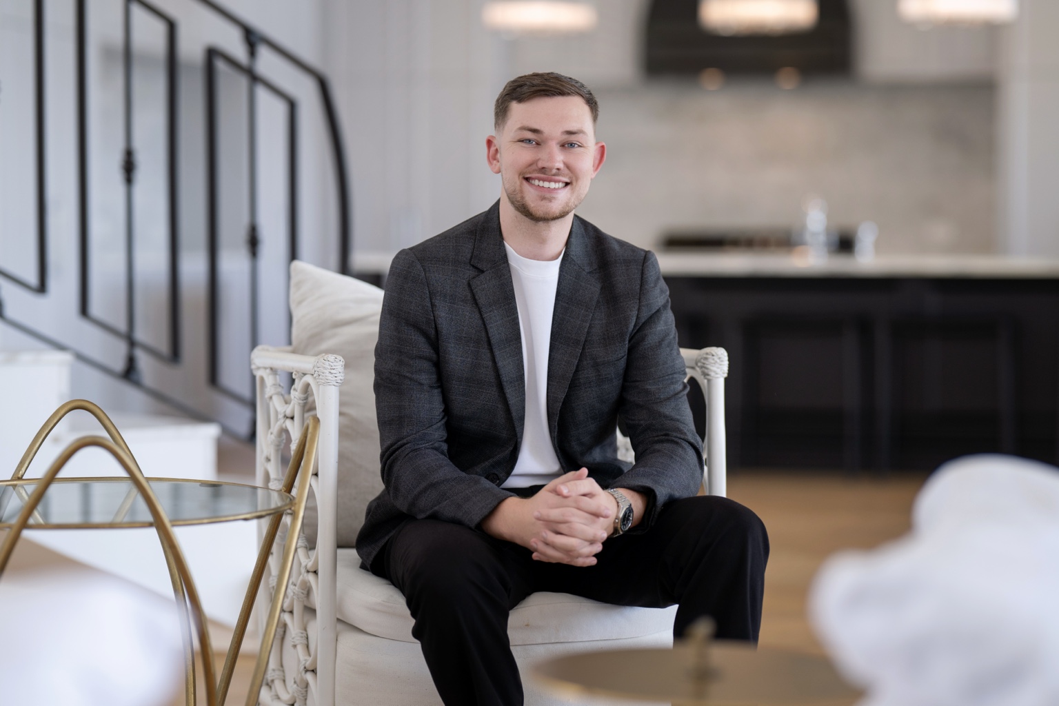 Bailey Hyland seated in a luxury home
